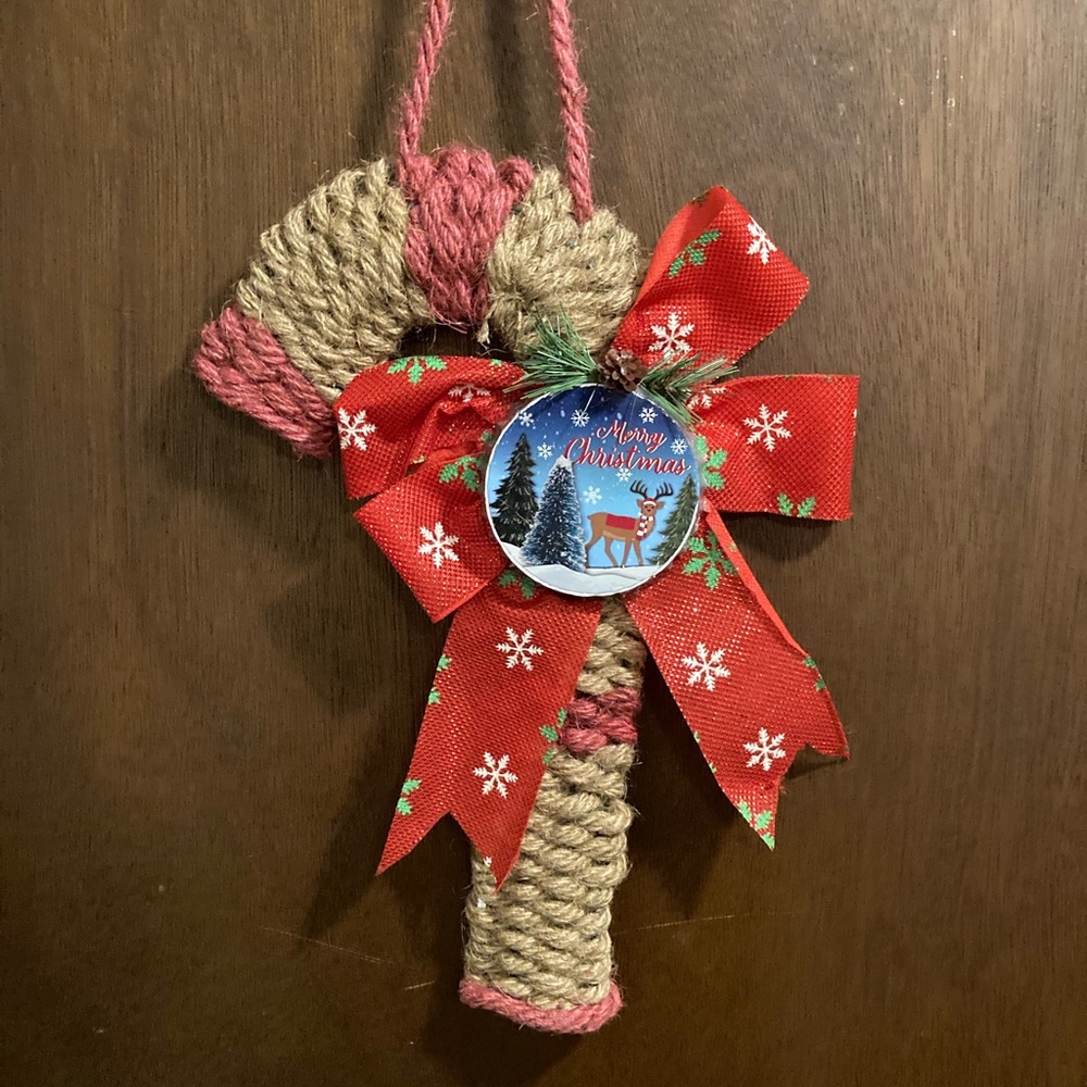 New handcrafted candy cane door hanger